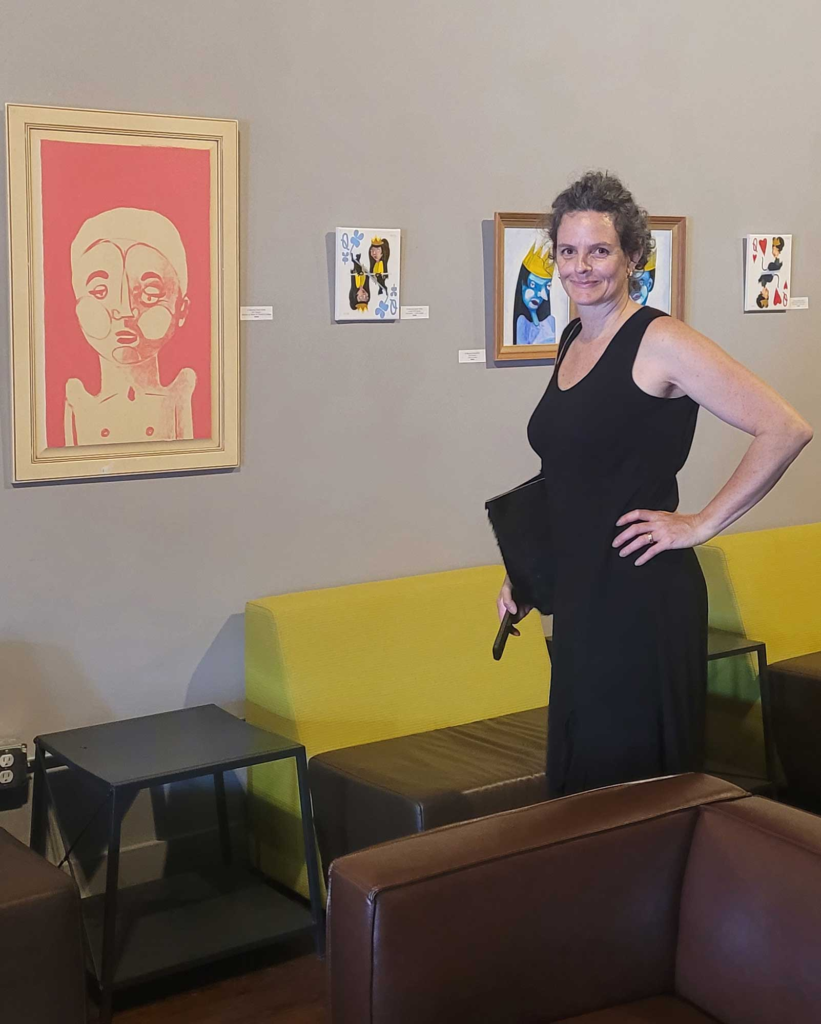 Marcela Slade in front of her arti installation at Yonder Bar in Hillsborough North Carolina